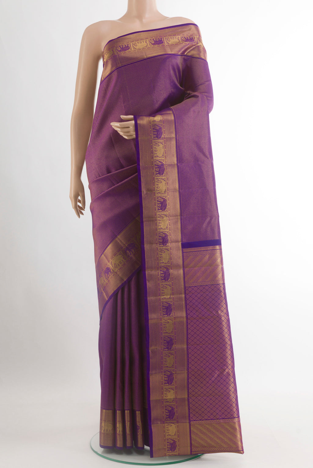 Violet Kanchipuram Silk Saree with Zari Brocade on the body and Zari Border.  displayed on a mannequin