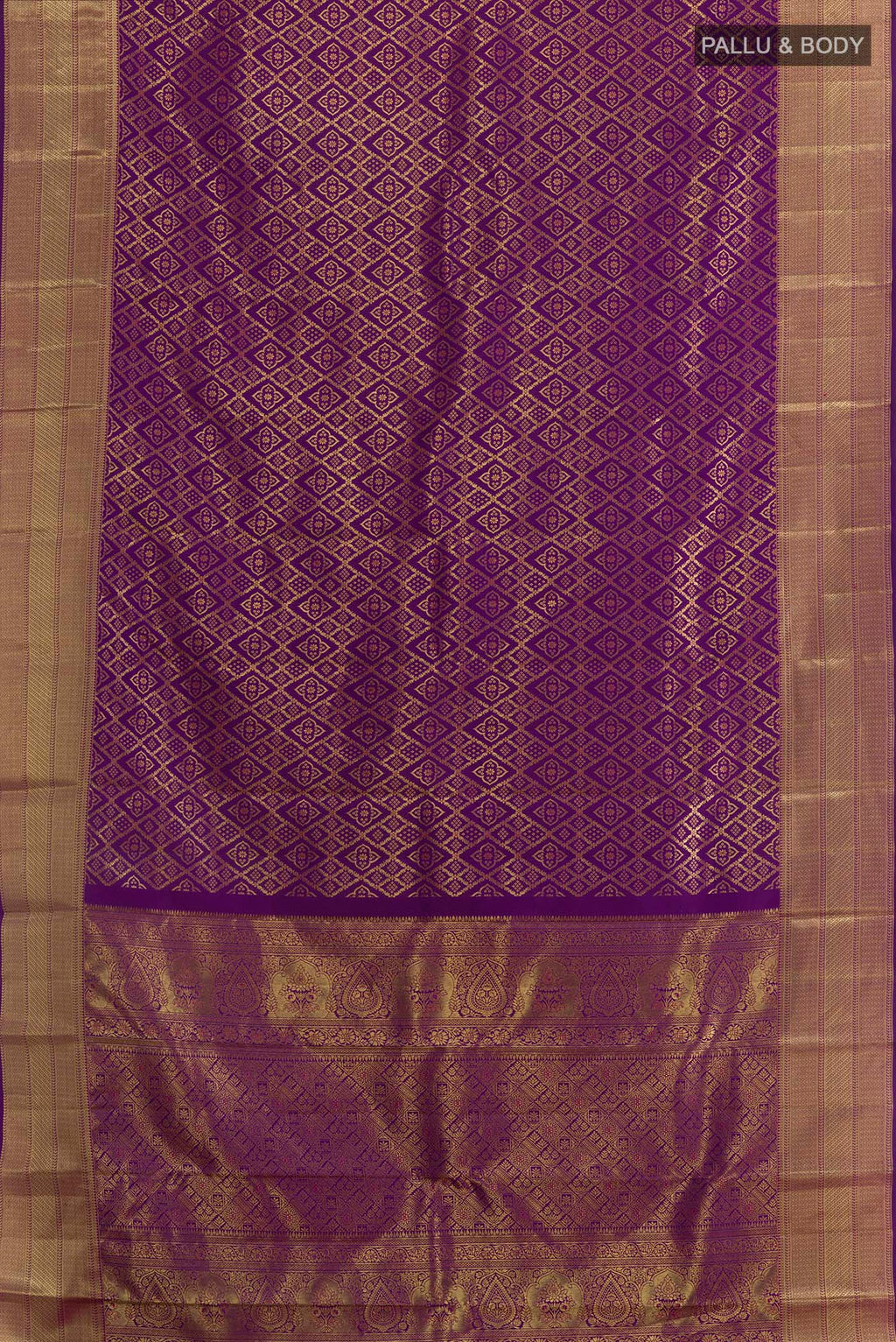 Flat view of Purple Kanchipuram Silk Saree with Zari Brocade on the body and Zari Border. 