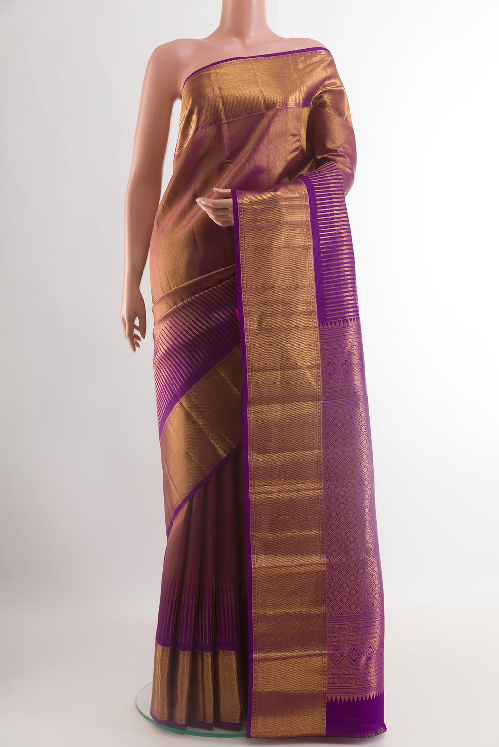 Purple Kanjivaram Silk Saree with Zari Brocade on the body and Zari Border.  displayed on a mannequin