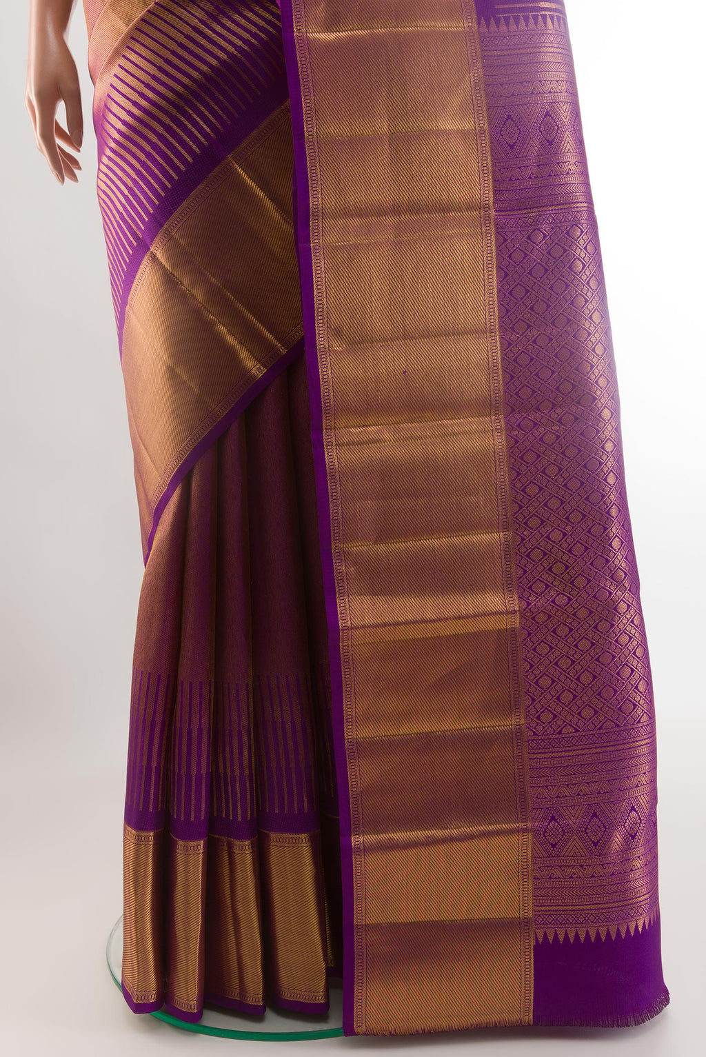 Pleats and pallu of Purple Kanjivaram Silk Saree with Zari Brocade on the body and Zari Border. 