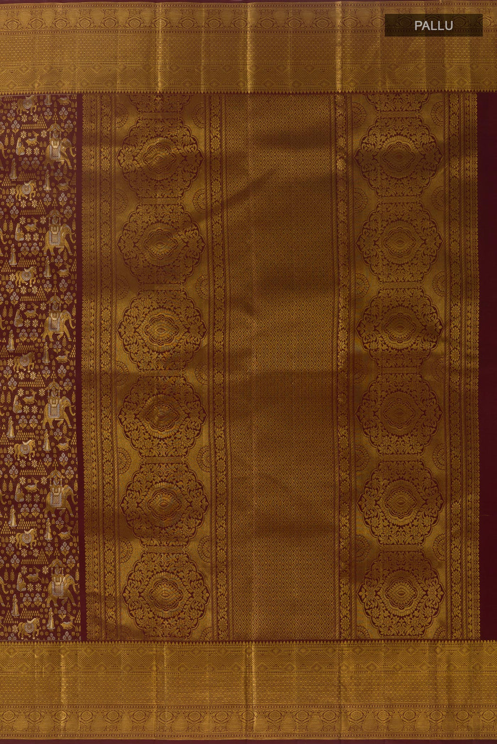 Close up image of the pallu of Brown Kanjivaram Silk Saree with Zari Brocade on the body and Zari Border. 