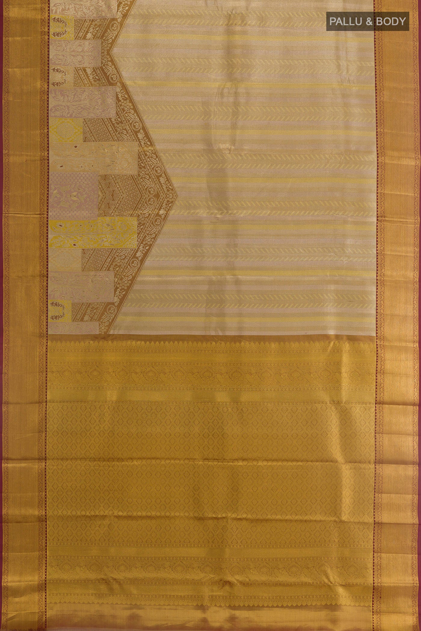 Flat view of Grey Kanchipuram Tissue Silk Saree with Zari Brocade on the body and Zari Border. 