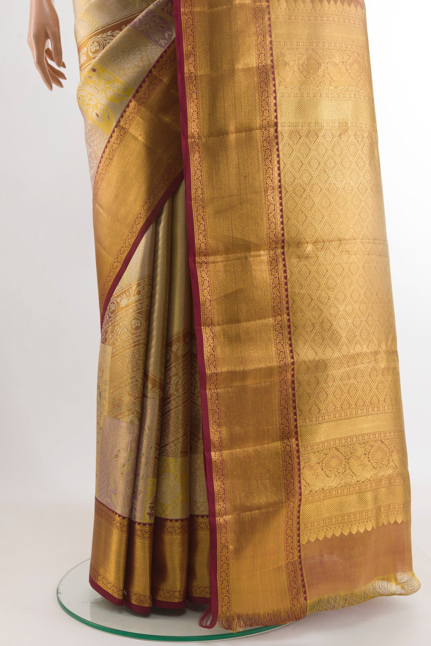 Pleats and pallu of Grey Kanchipuram Tissue Silk Saree with Zari Brocade on the body and Zari Border. 