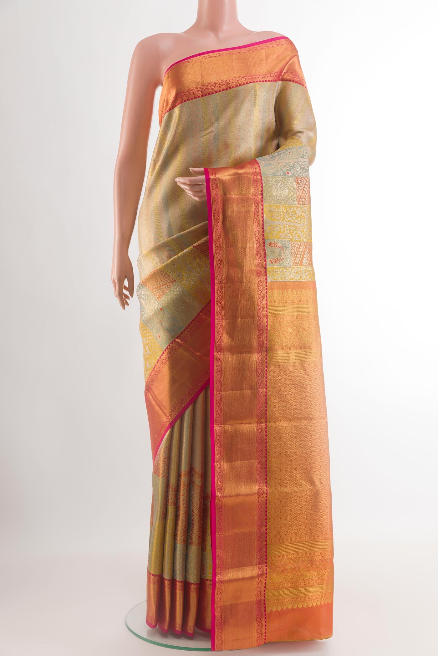 Multi Color Kanchipuram Tissue Silk Saree with Zari Brocade on the body and Zari Border.  displayed on a mannequin