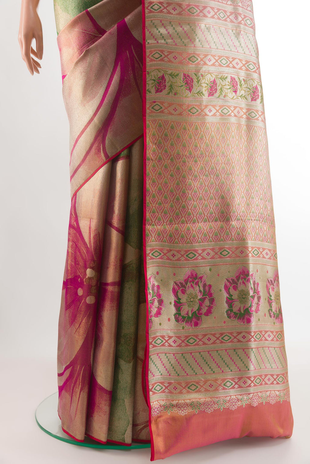 Pleats and pallu of Green Kanjivaram Tissue Silk Saree with Zari Brocade on the body and Zari Border. 