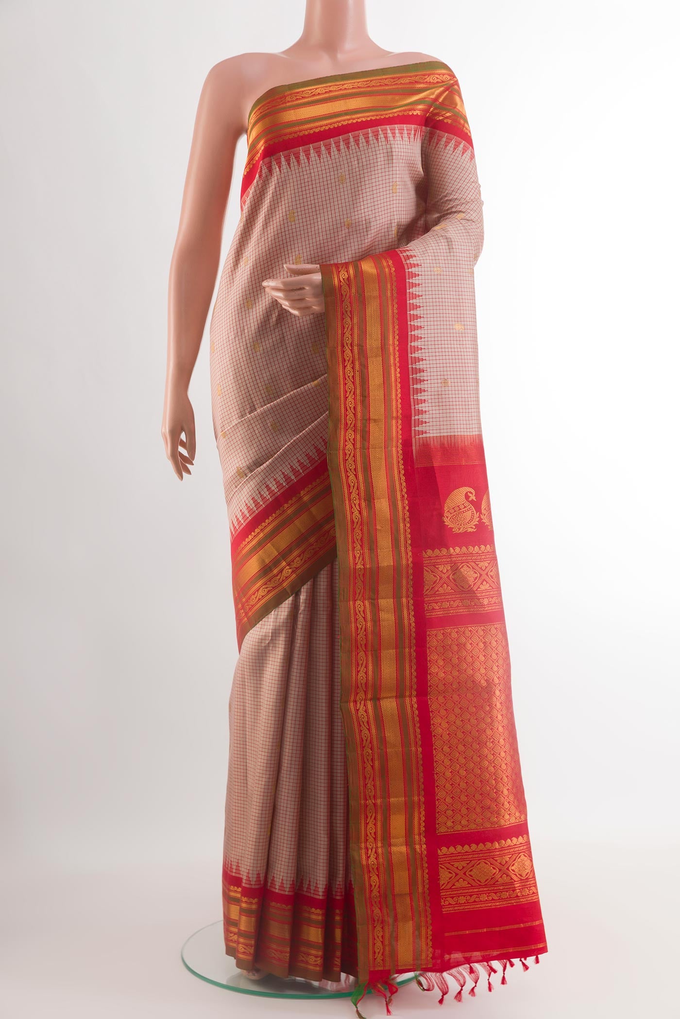 Grey Gadwal Silk Saree with Checked design on the body and Zari Border.  displayed on a mannequin