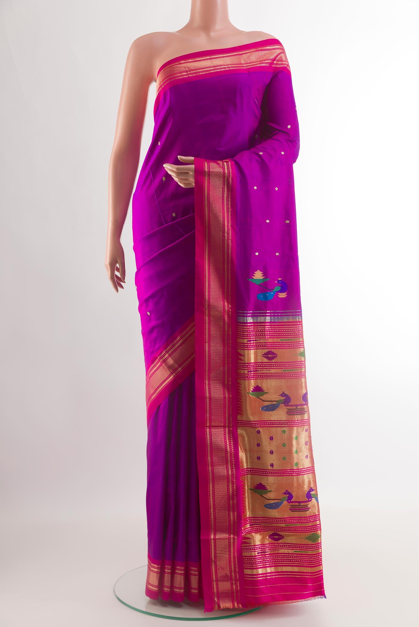 Purple Paithani Silk Saree with Zari Butta on the body and Zari Border.  displayed on a mannequin
