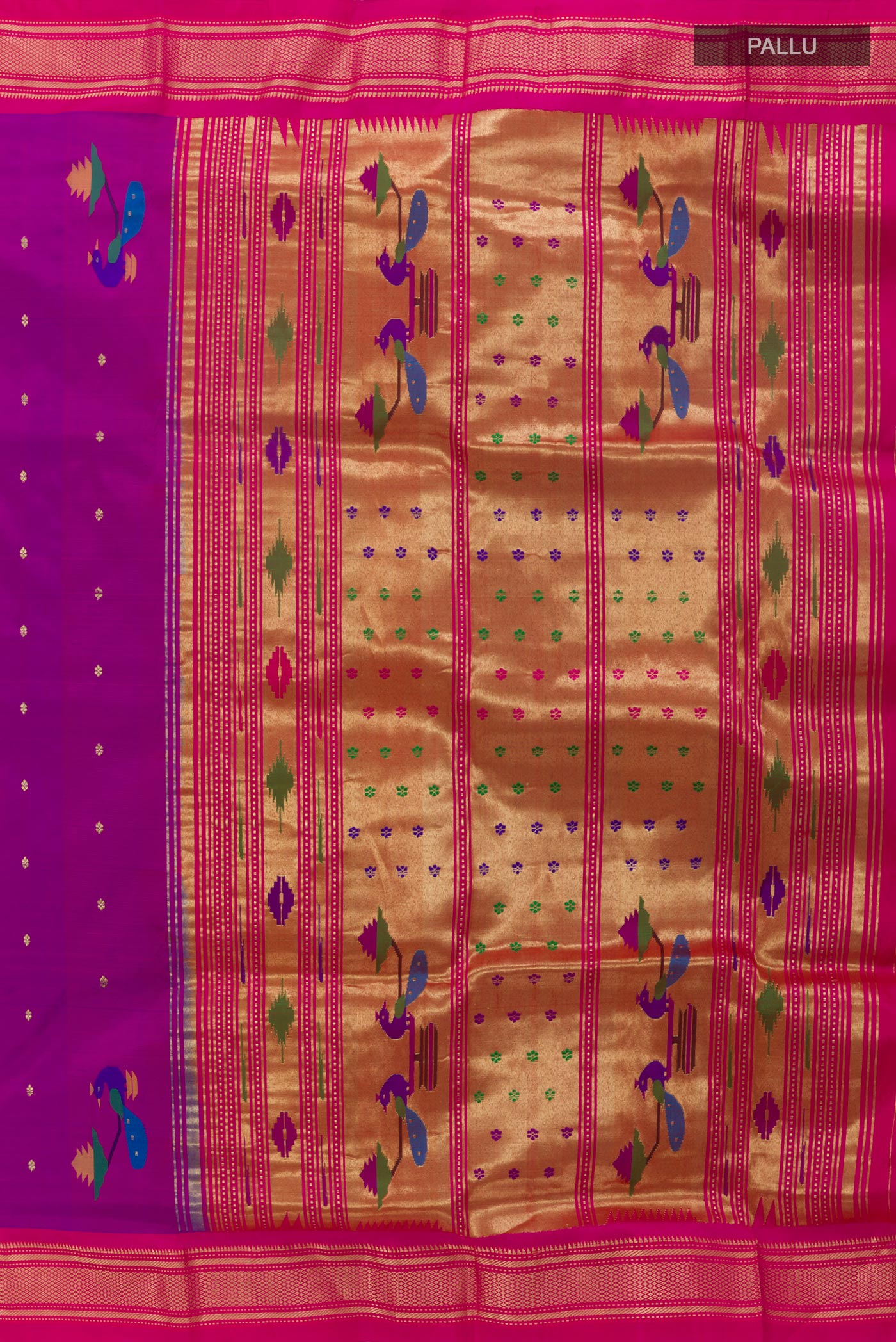 Close up image of the pallu of Purple Paithani Silk Saree with Zari Butta on the body and Zari Border. 