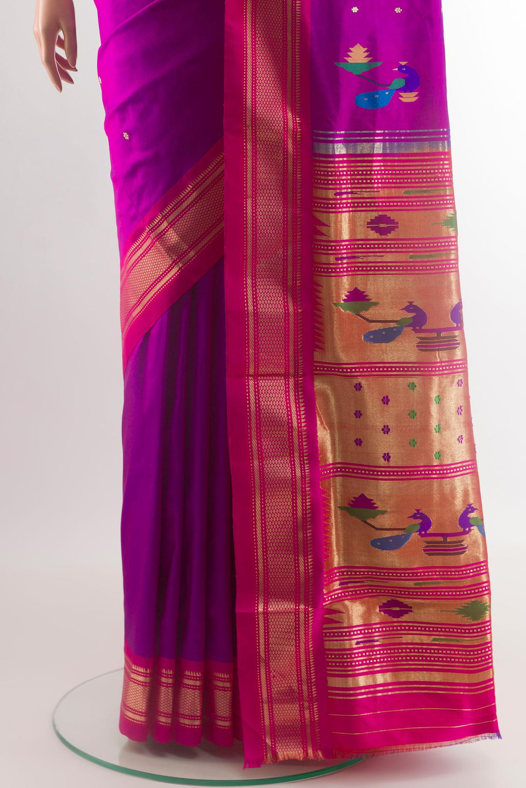 Pleats and pallu of Purple Paithani Silk Saree with Zari Butta on the body and Zari Border. 