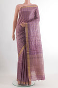 Lavender Tussar Silk Saree with Checked design on the body and Zari Border.  displayed on a mannequin