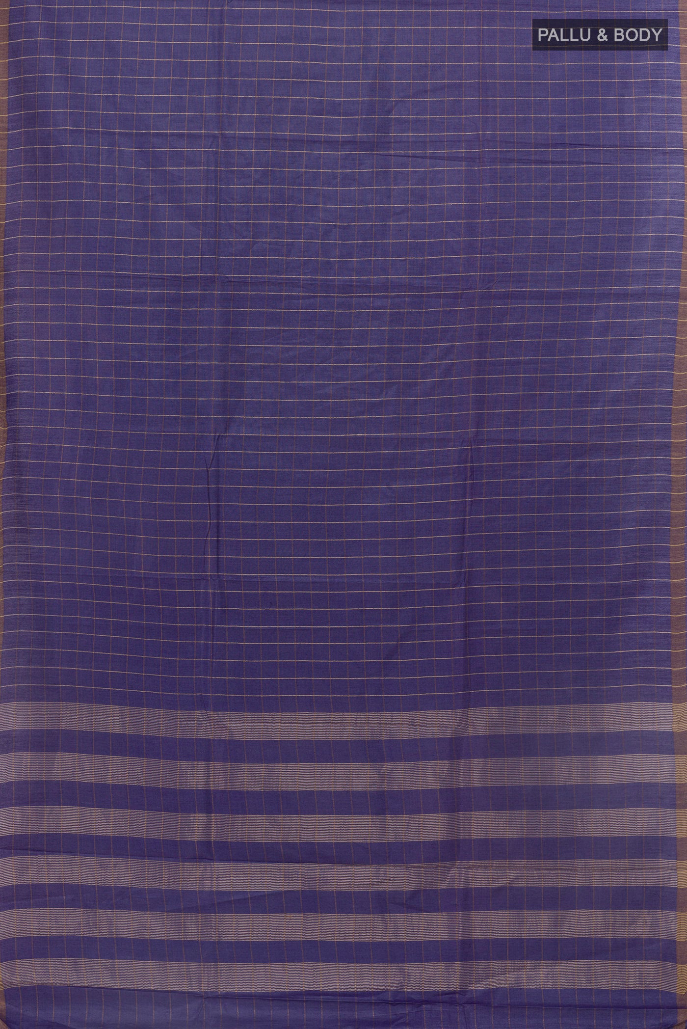 Flat view of Blue Tussar Saree with Checked design on the body and Zari Border. 