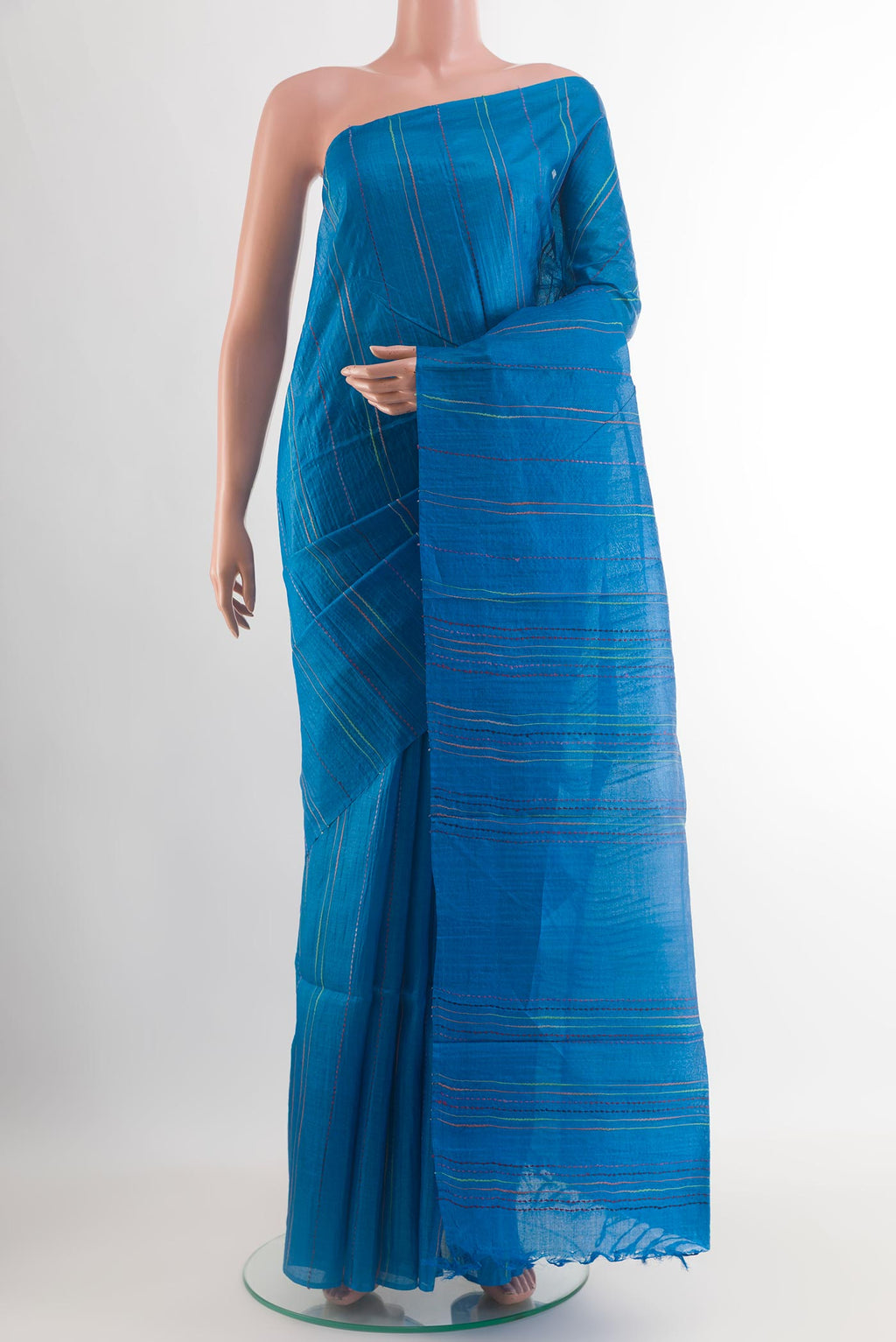 Royal Blue Tussar Silk Saree with Stripes on the body and Without Border.  displayed on a mannequin