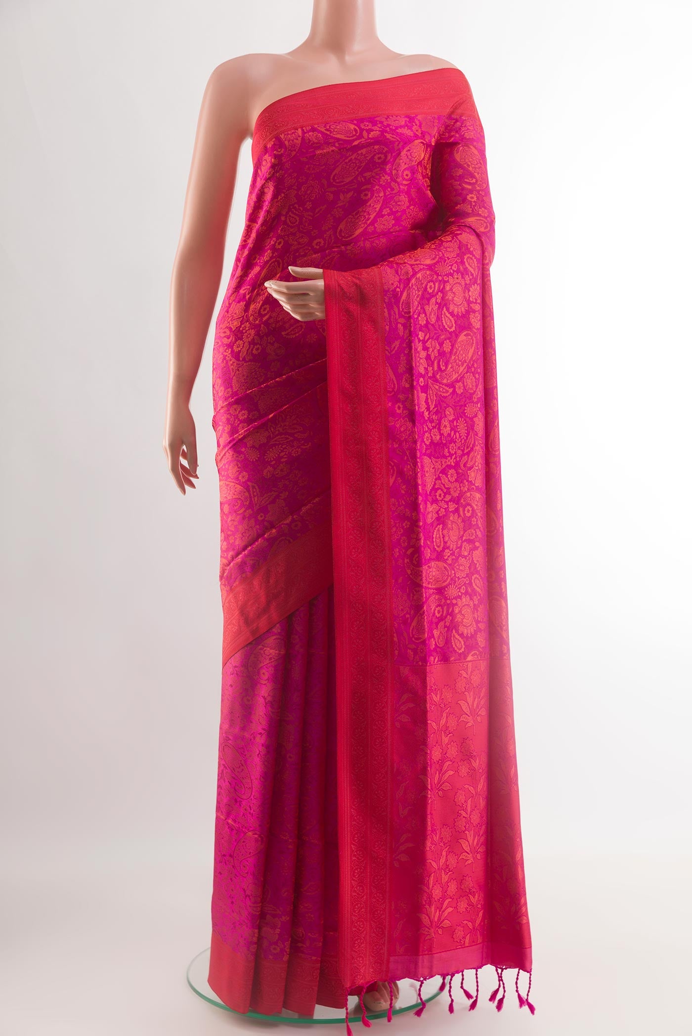 Pink Soft Silk Saree with Jacquard design on the body and Thread Border.  displayed on a mannequin