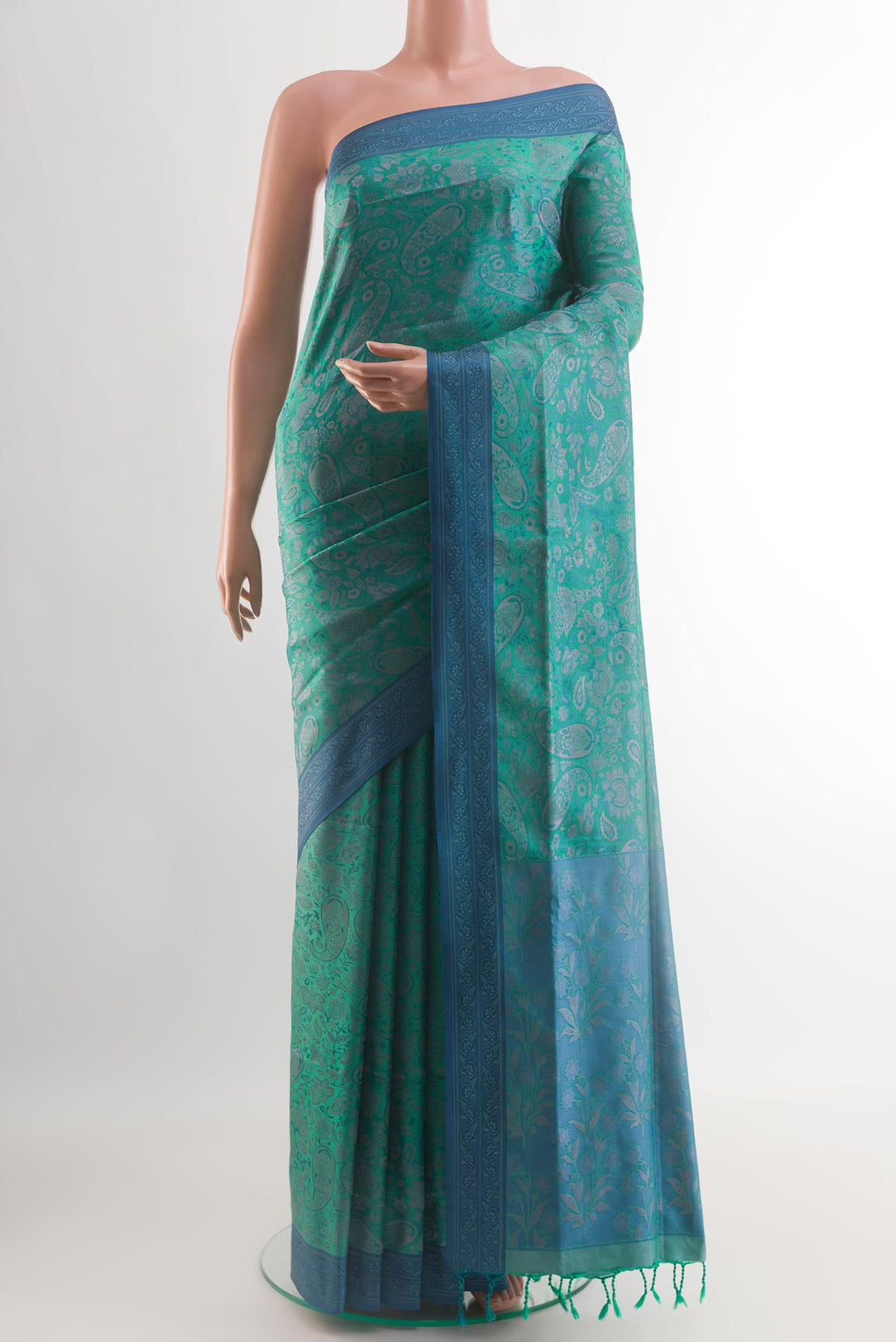 Sea Green Soft Silk Saree with Jacquard design on the body and Embroidery Border.  displayed on a mannequin