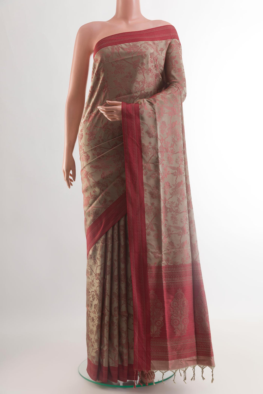 Grey Soft Silk Saree with Jacquard design on the body and Embroidery Border.  displayed on a mannequin