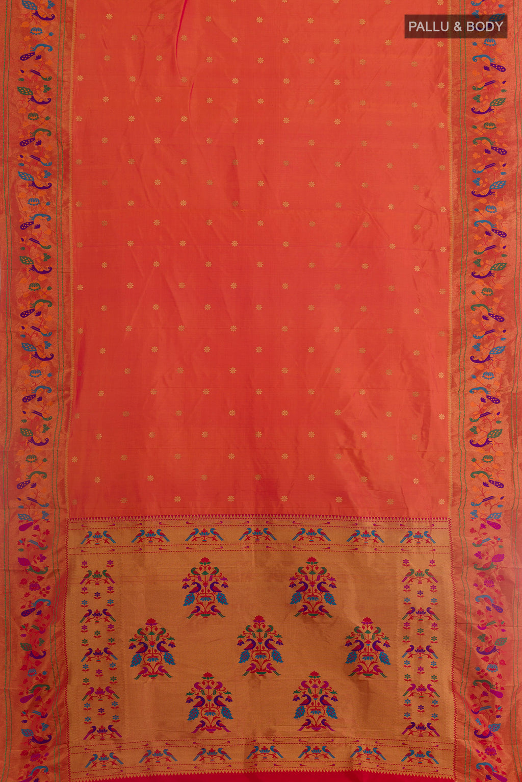 Flat view of Brick Orange Gadwal Silk Saree with Zari Butta on the body and Paithani Border. 