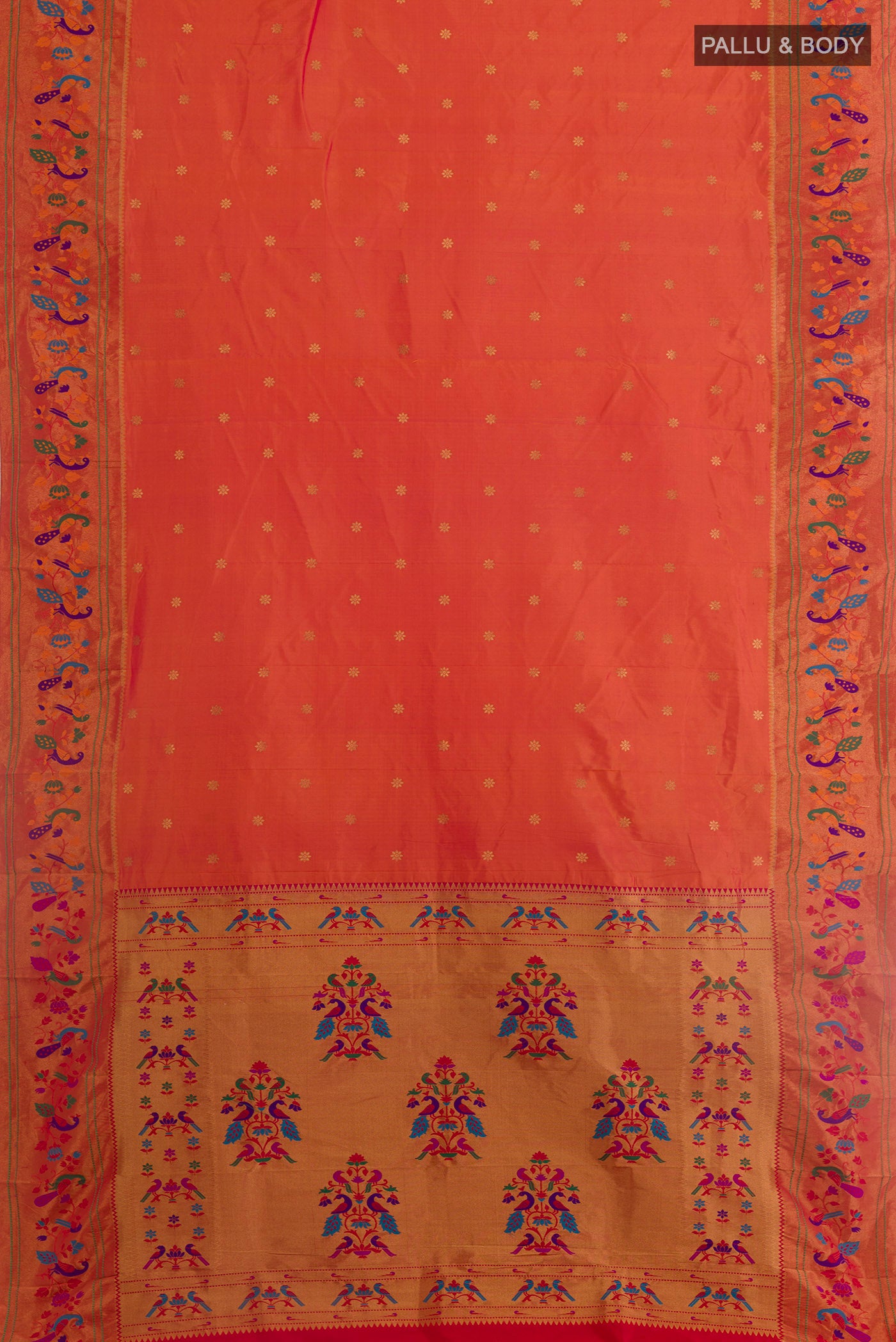 Flat view of Brick Orange Gadwal Silk Saree with Zari Butta on the body and Paithani Border. 
