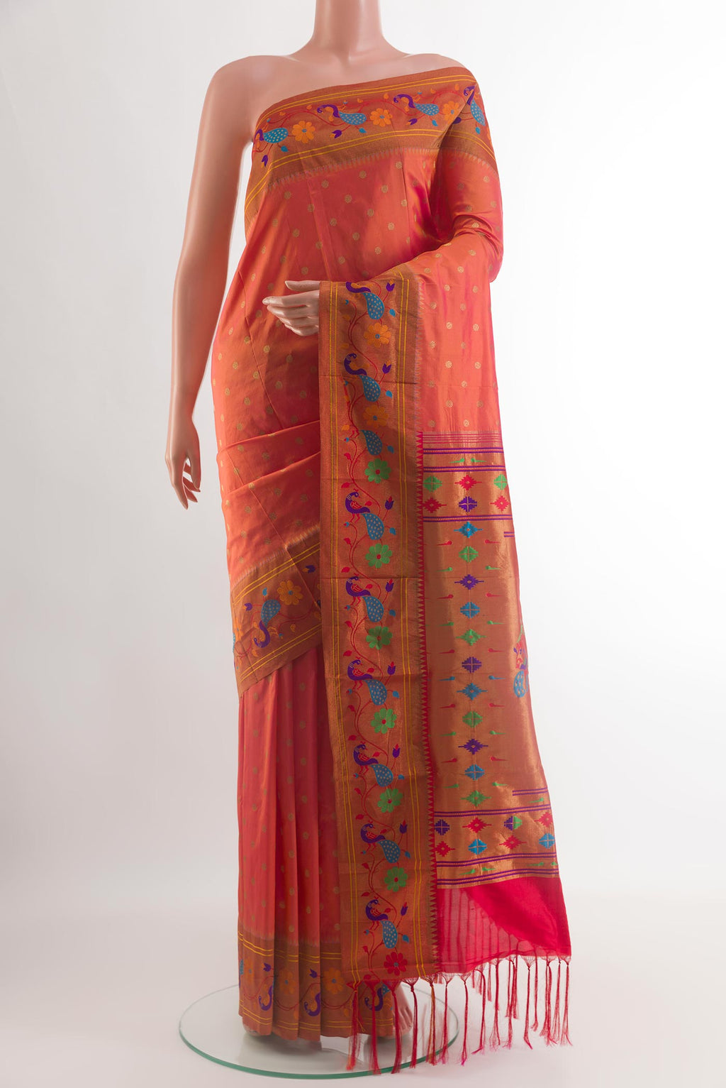 Peach Gadwal Silk Saree with Zari Butta on the body and Paithani Border.  displayed on a mannequin