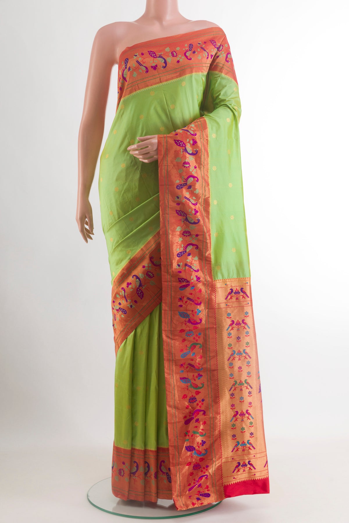 Green Gadwal Silk Saree with Zari Butta on the body and Paithani Border.  displayed on a mannequin