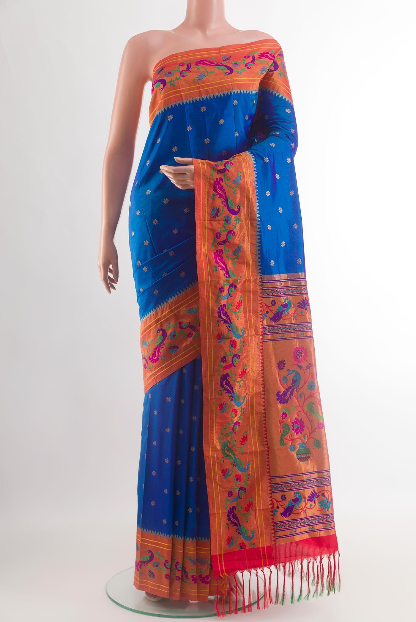 Royal Blue Gadwal Silk Saree with Zari Butta on the body and Paithani Border.  displayed on a mannequin