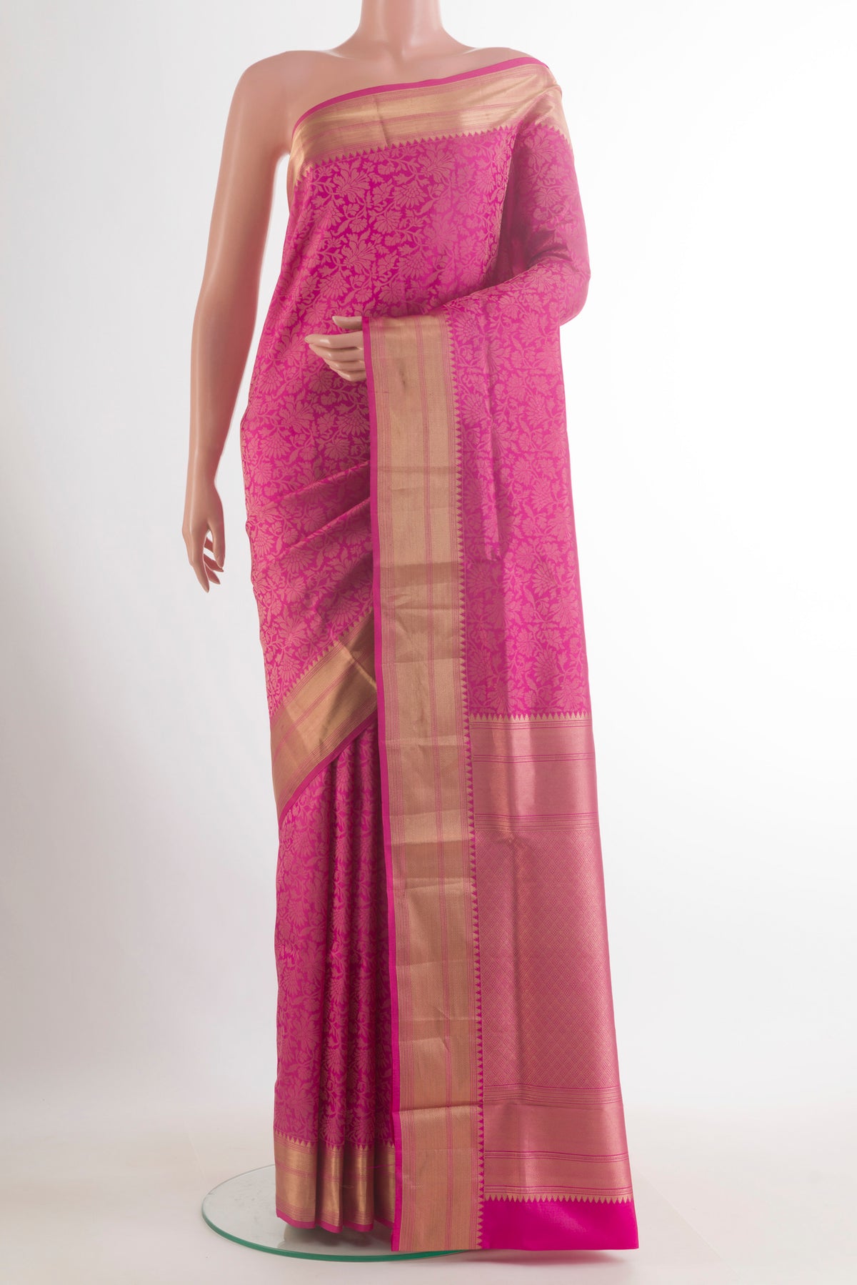 Pure Silk Pink Soft Saree with Zari Brocade on the body and Zari Border.  displayed on a mannequin