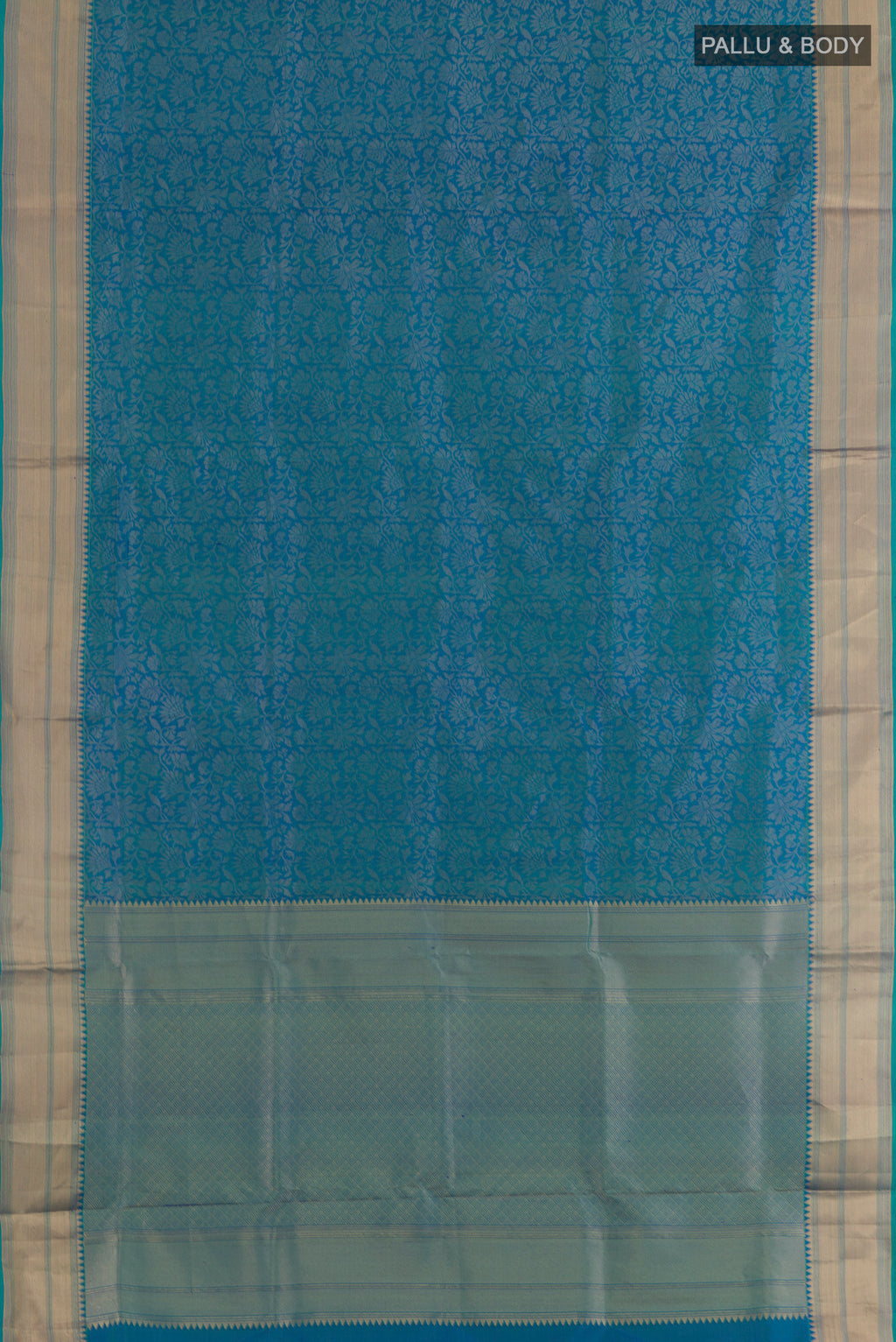 Flat view of Peacock Blue Soft Silk Saree with Zari Brocade on the body and Zari Border. 