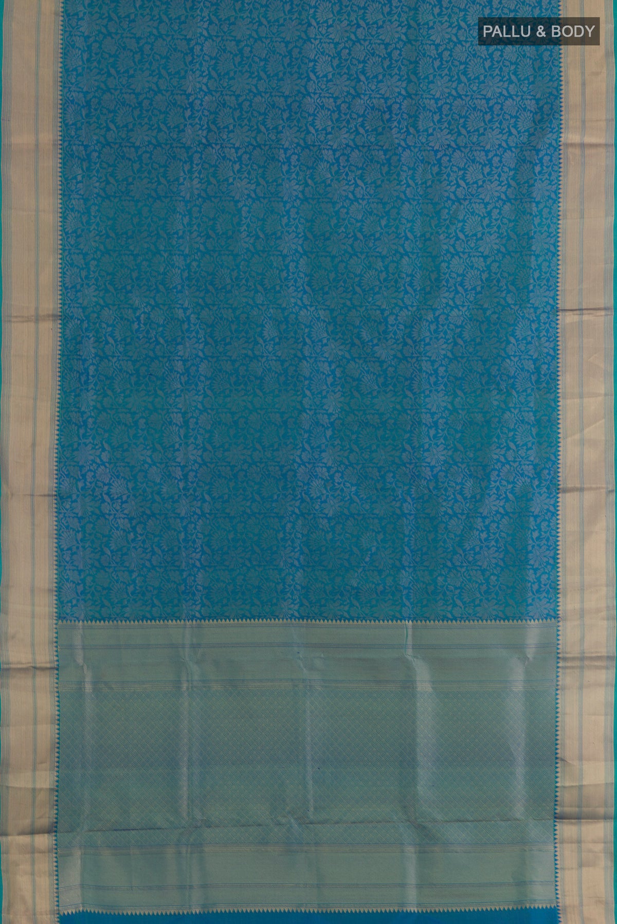 Flat view of Peacock Blue Soft Silk Saree with Zari Brocade on the body and Zari Border. 
