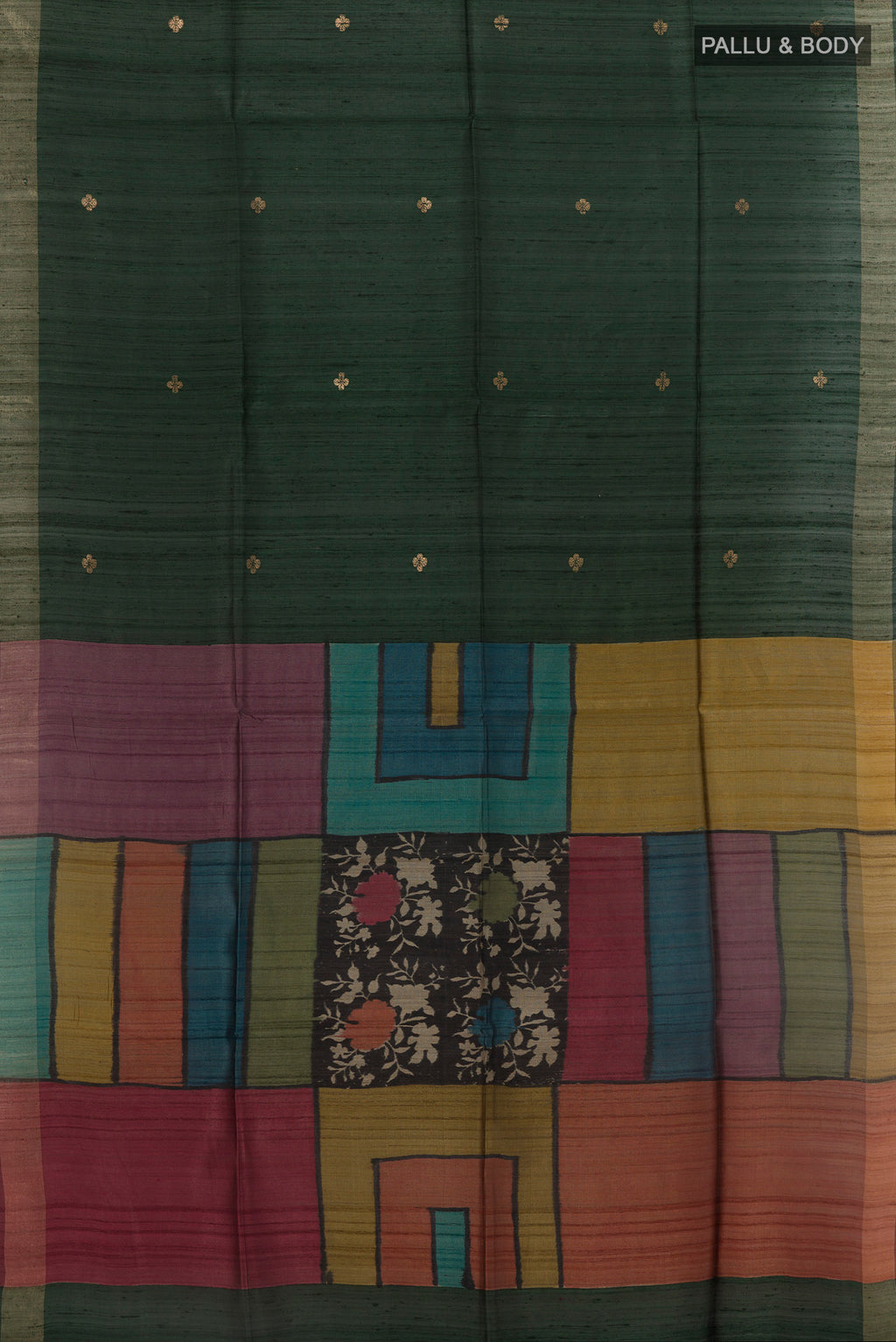 Flat view of Bottle Green Tussar Silk Saree with Zari Butta on the body and Zari Border. 