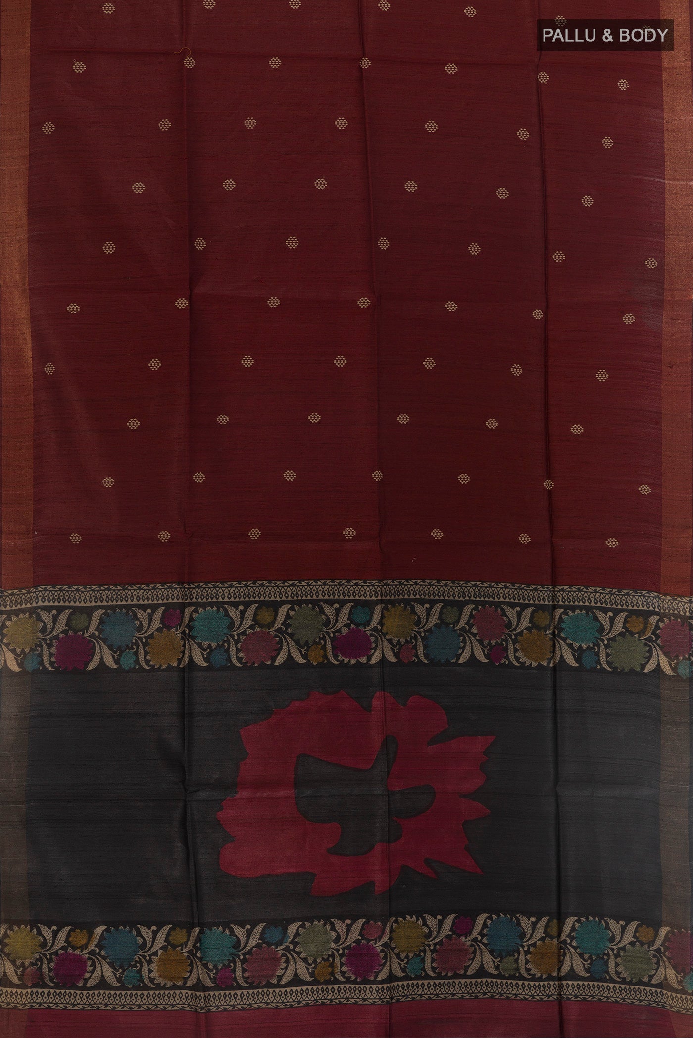 Flat view of Brown Tussar Silk Saree with Thread Butta on the body and Zari Border. 