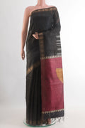 Black Tussar Silk Saree with Stripes on the body and Zari Border.  displayed on a mannequin