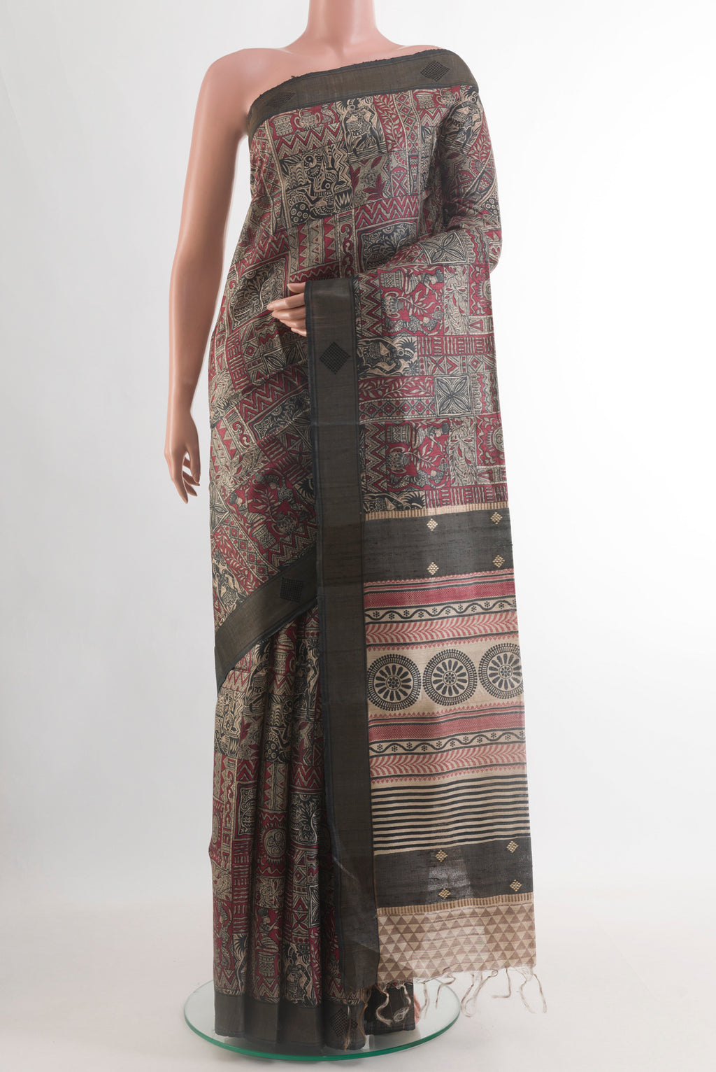 Multi Color Tussar Silk Saree with Printed design on the body and Zari Border.  displayed on a mannequin