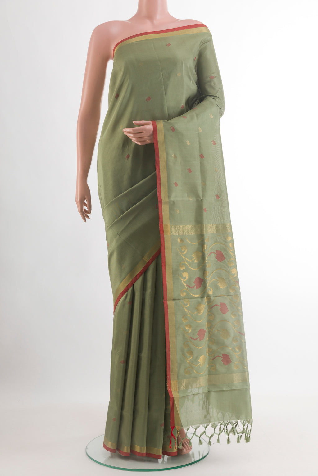 Sage Green Uppada Silk Saree with Zari Butta on the body and Zari Border.  displayed on a mannequin