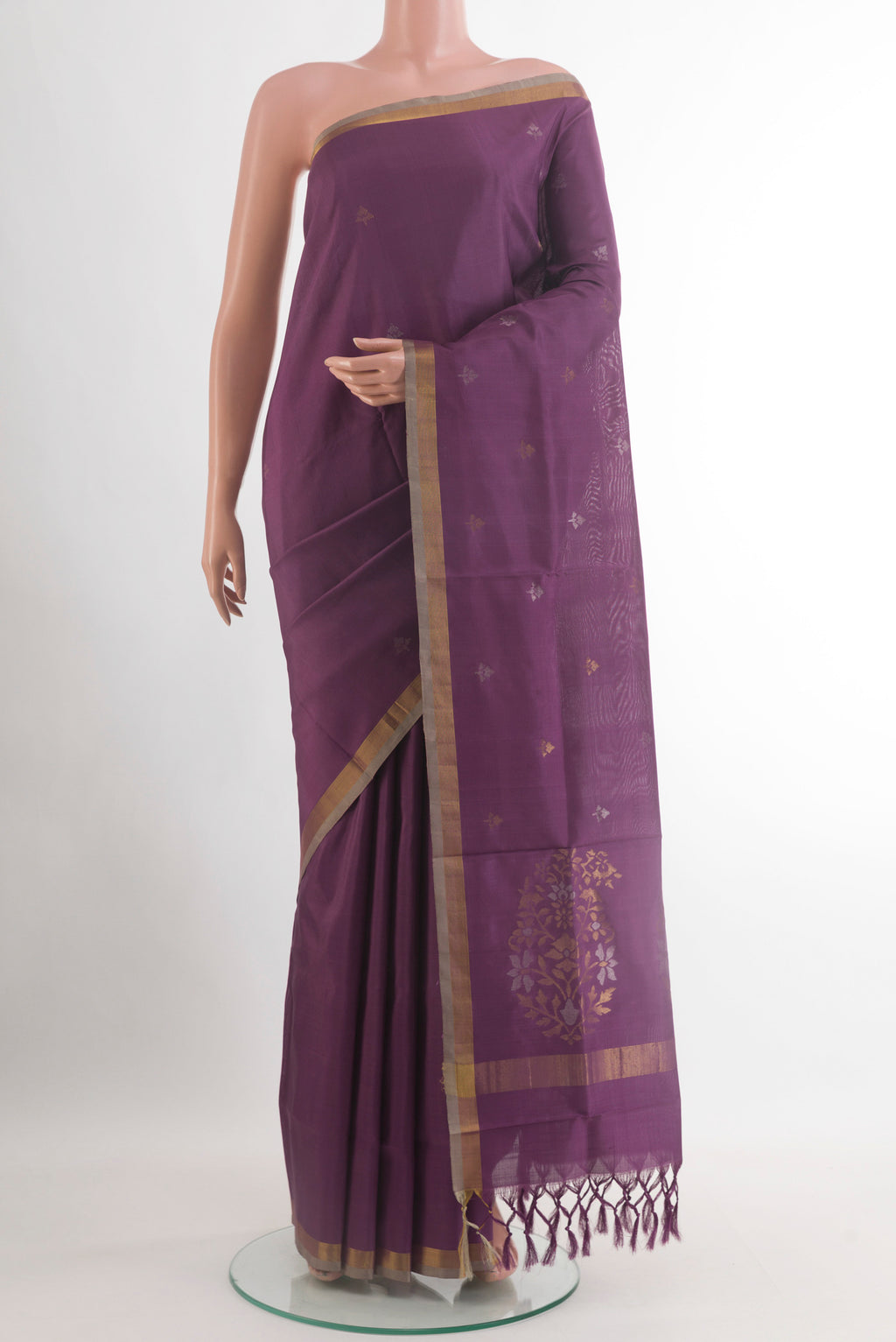 Purple Uppada Silk Saree with Zari Butta on the body and Zari Border.  displayed on a mannequin