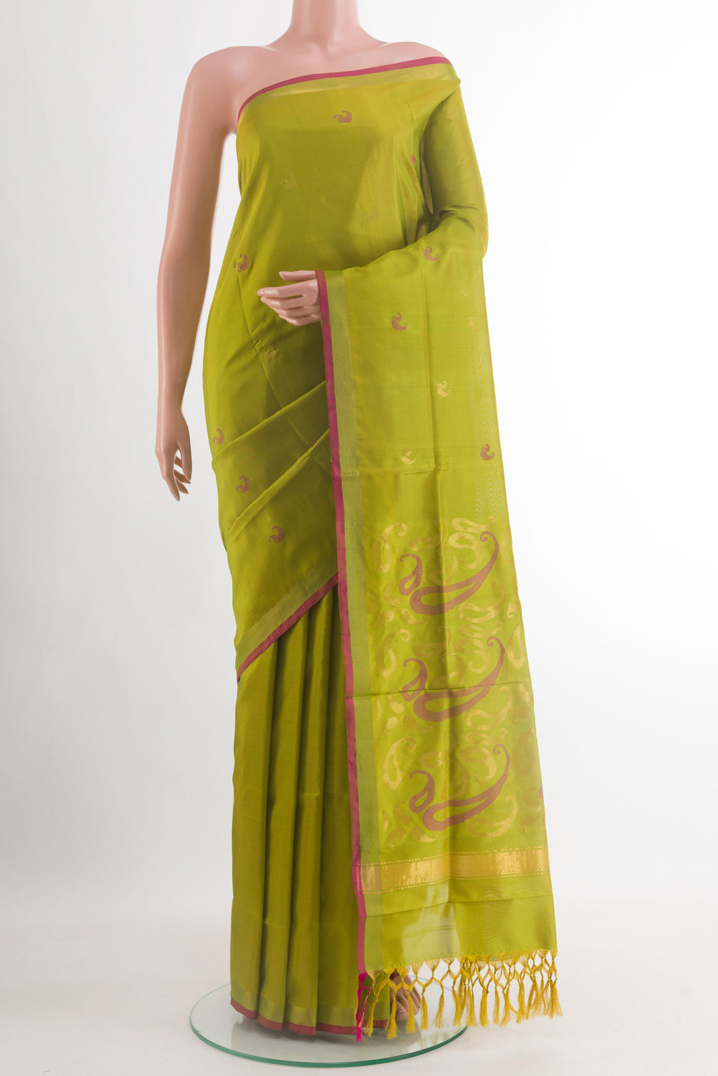 Light Green Uppada Silk Saree with Zari Butta on the body and Zari Border.  displayed on a mannequin