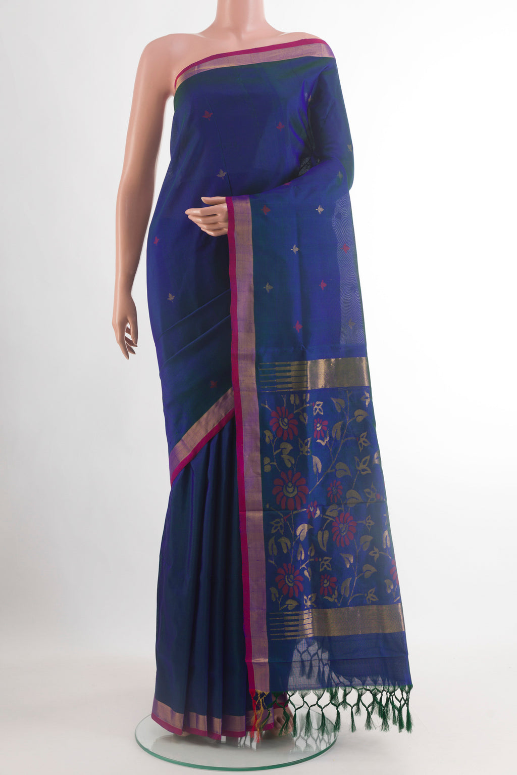 Peacock Blue Uppada Silk Saree with Zari Butta on the body and Zari Border.  displayed on a mannequin