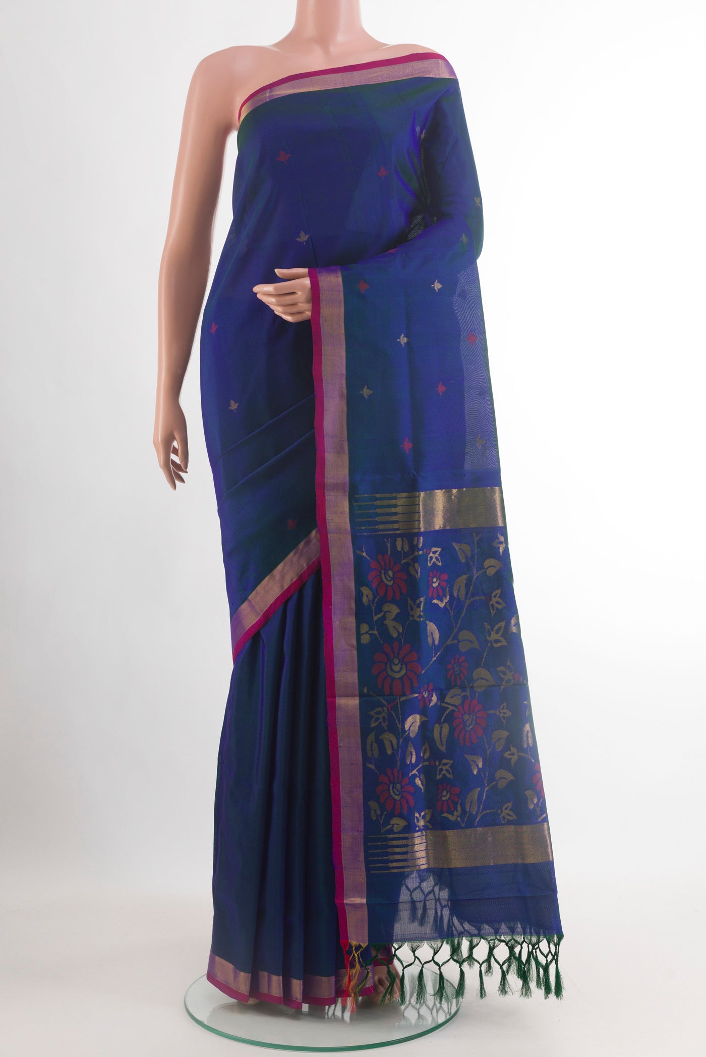 Peacock Blue Uppada Silk Saree with Zari Butta on the body and Zari Border.  displayed on a mannequin