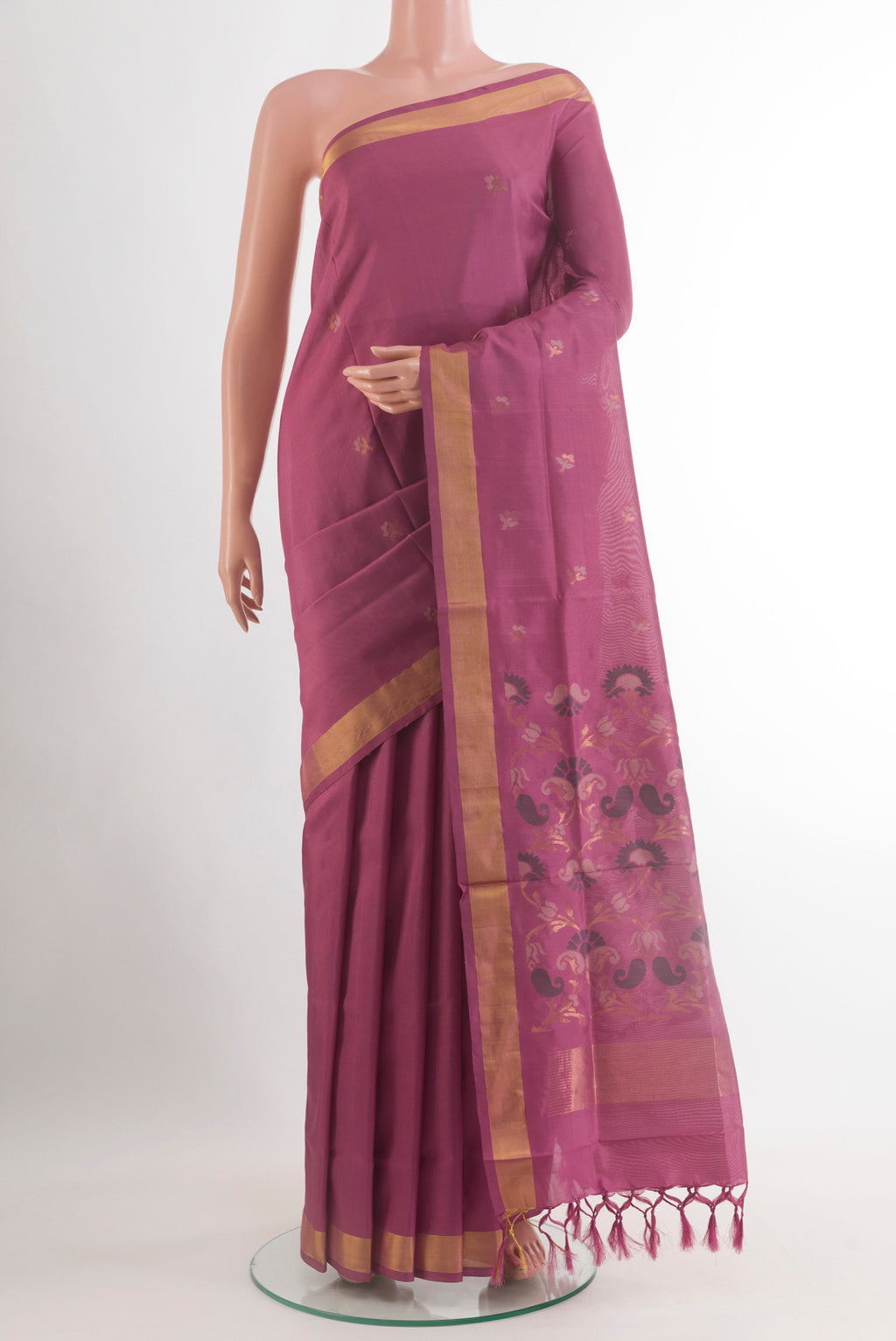 Light Magenta Uppada Silk Saree with Zari Butta on the body and Zari Border.  displayed on a mannequin