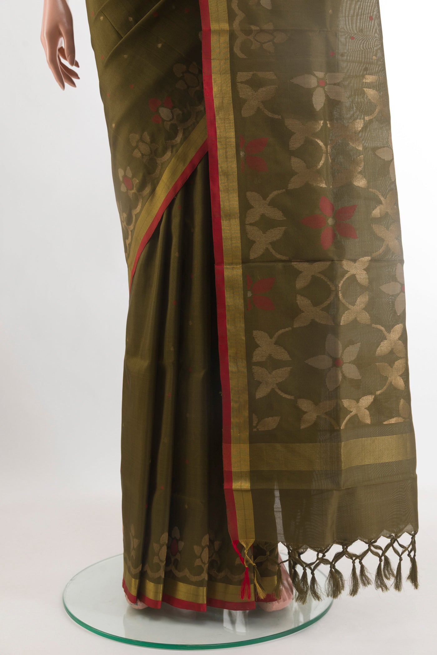 Pleats and pallu of Mehandi Green Uppada Silk Saree with Zari Butta on the body and Zari Border. 