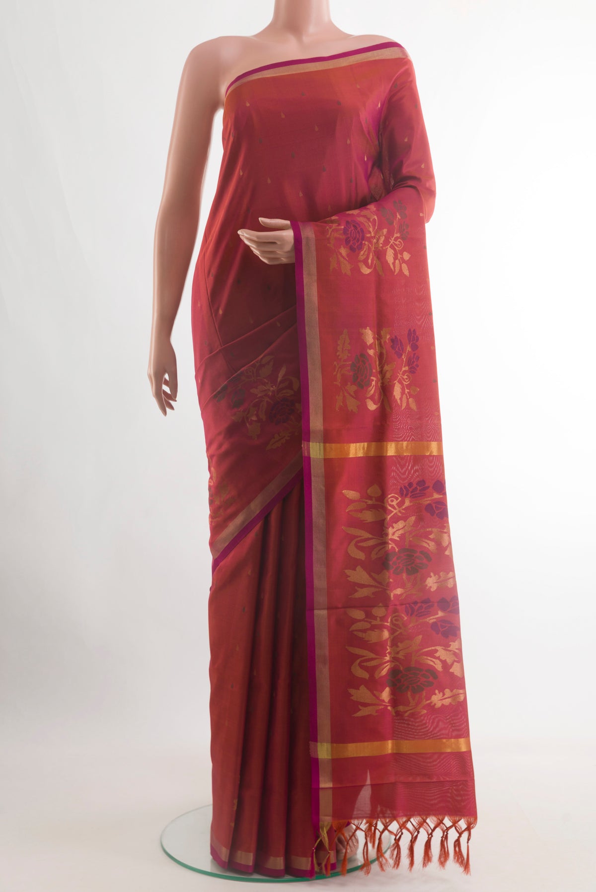 Pink with Orange Color Uppada Silk Saree with Zari Butta on the body and Zari Border.  displayed on a mannequin