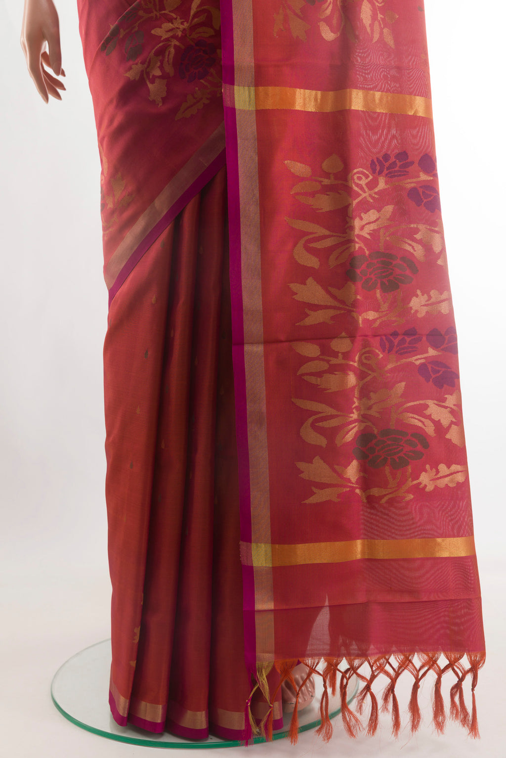 Pleats and pallu of Pink with Orange Color Uppada Silk Saree with Zari Butta on the body and Zari Border. 