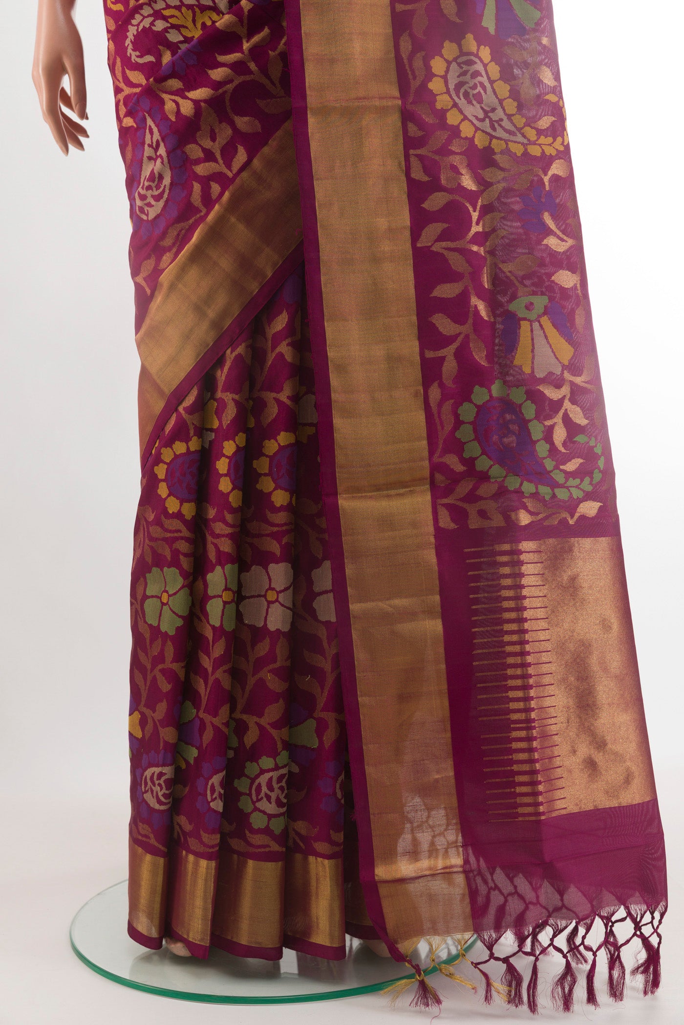 Pleats and pallu of Purple Uppada Silk Saree with Zari Brocade on the body and Zari Border. 