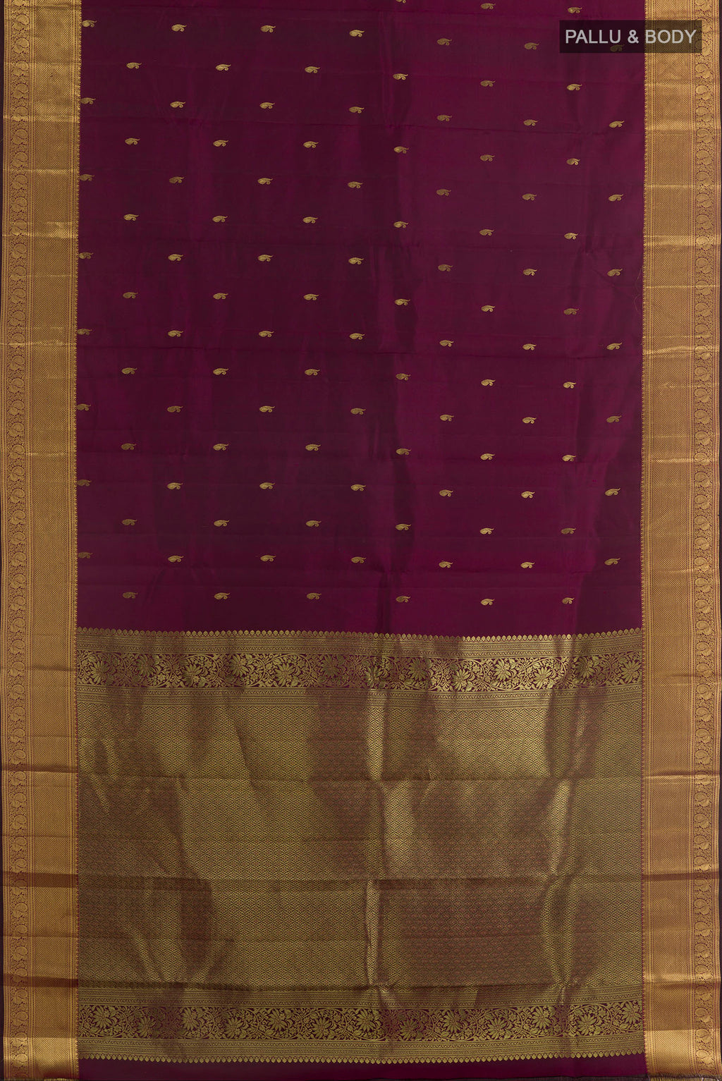 Flat view of Purple Kanjivaram Silk Saree with Zari Butta on the body and Zari Border. 