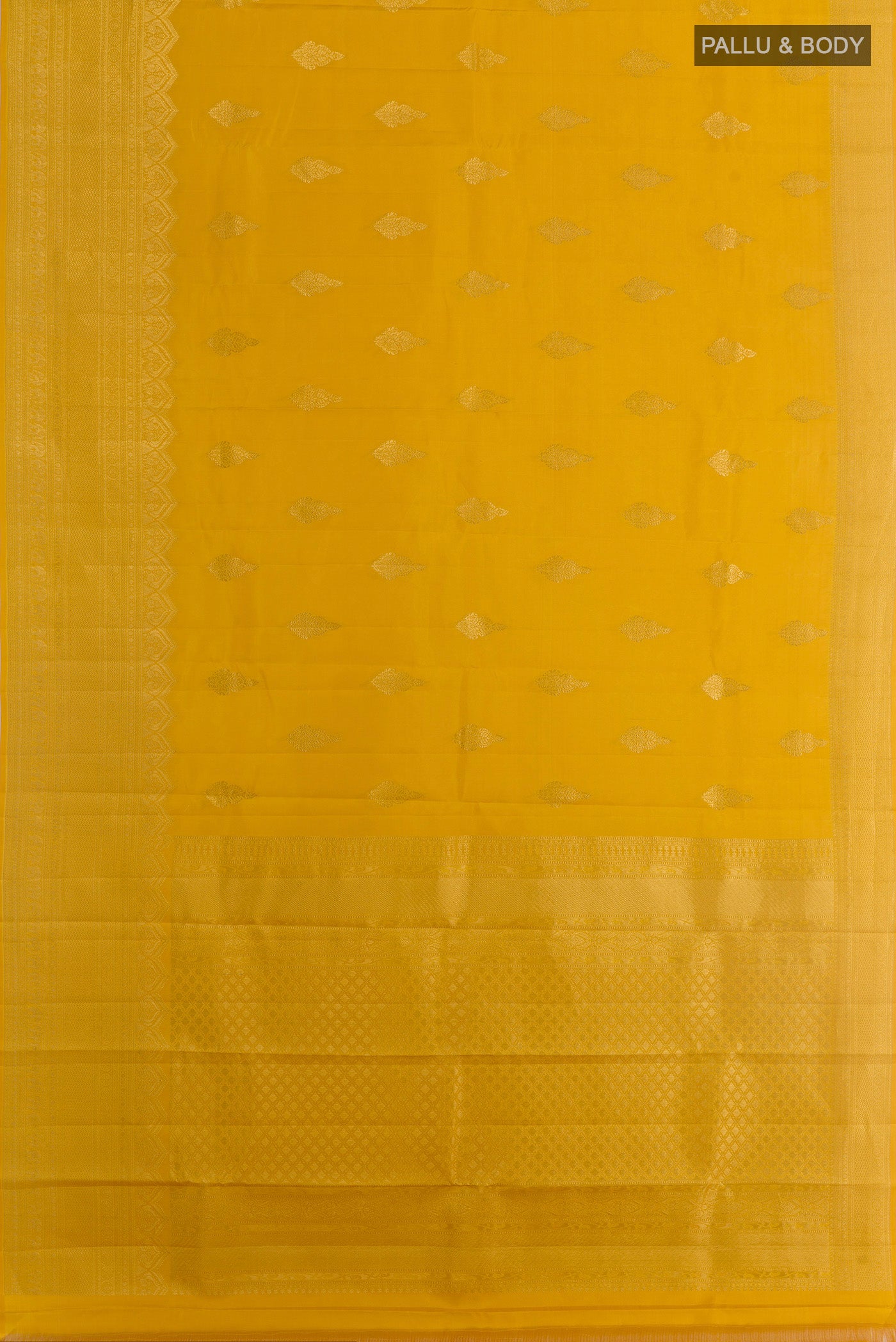 Flat view of Yellow Kanchipuram Silk Saree with Zari Butta on the body and Zari Border. 
