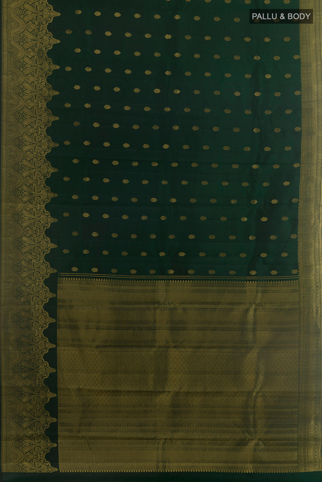 Flat view of Bottle Green Kanchipuram Silk Saree with Zari Butta on the body and Zari Border. 