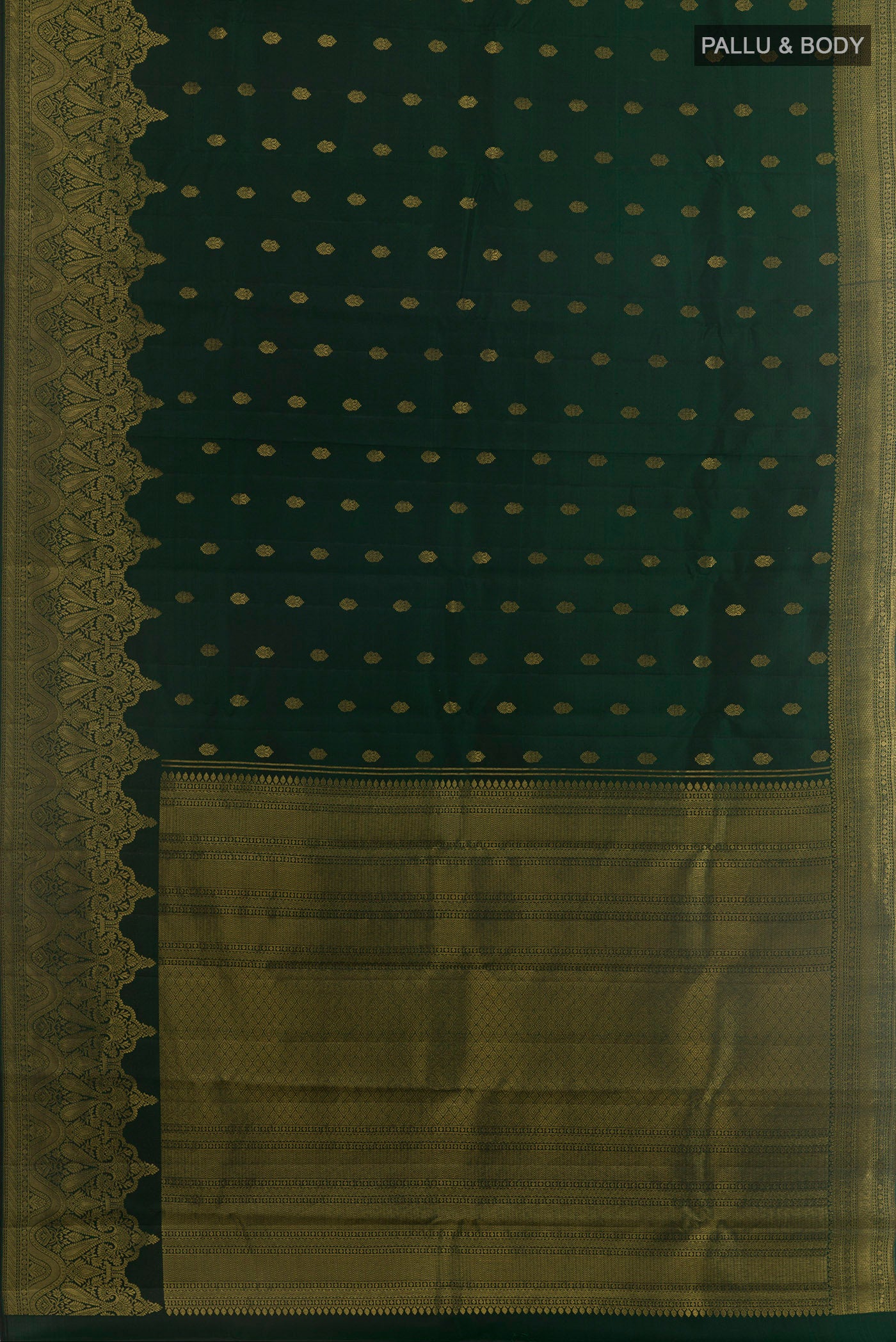 Flat view of Bottle Green Kanchipuram Silk Saree with Zari Butta on the body and Zari Border. 