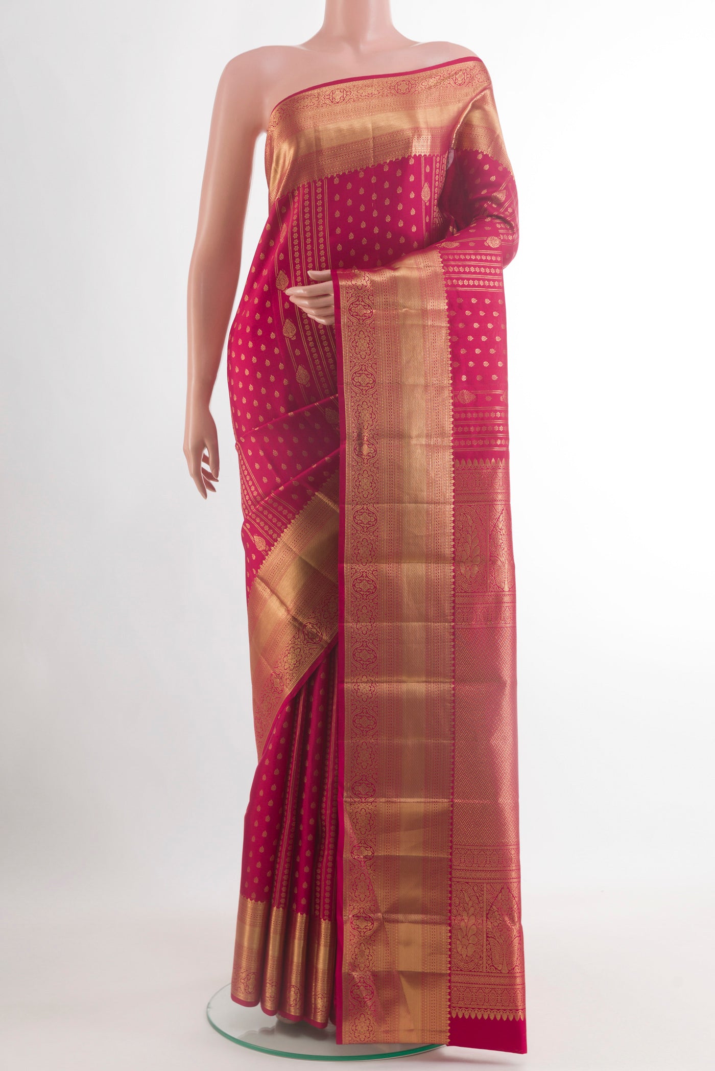 Maroon Kanchipuram Silk Saree with Zari Brocade on the body and Zari Border.  displayed on a mannequin