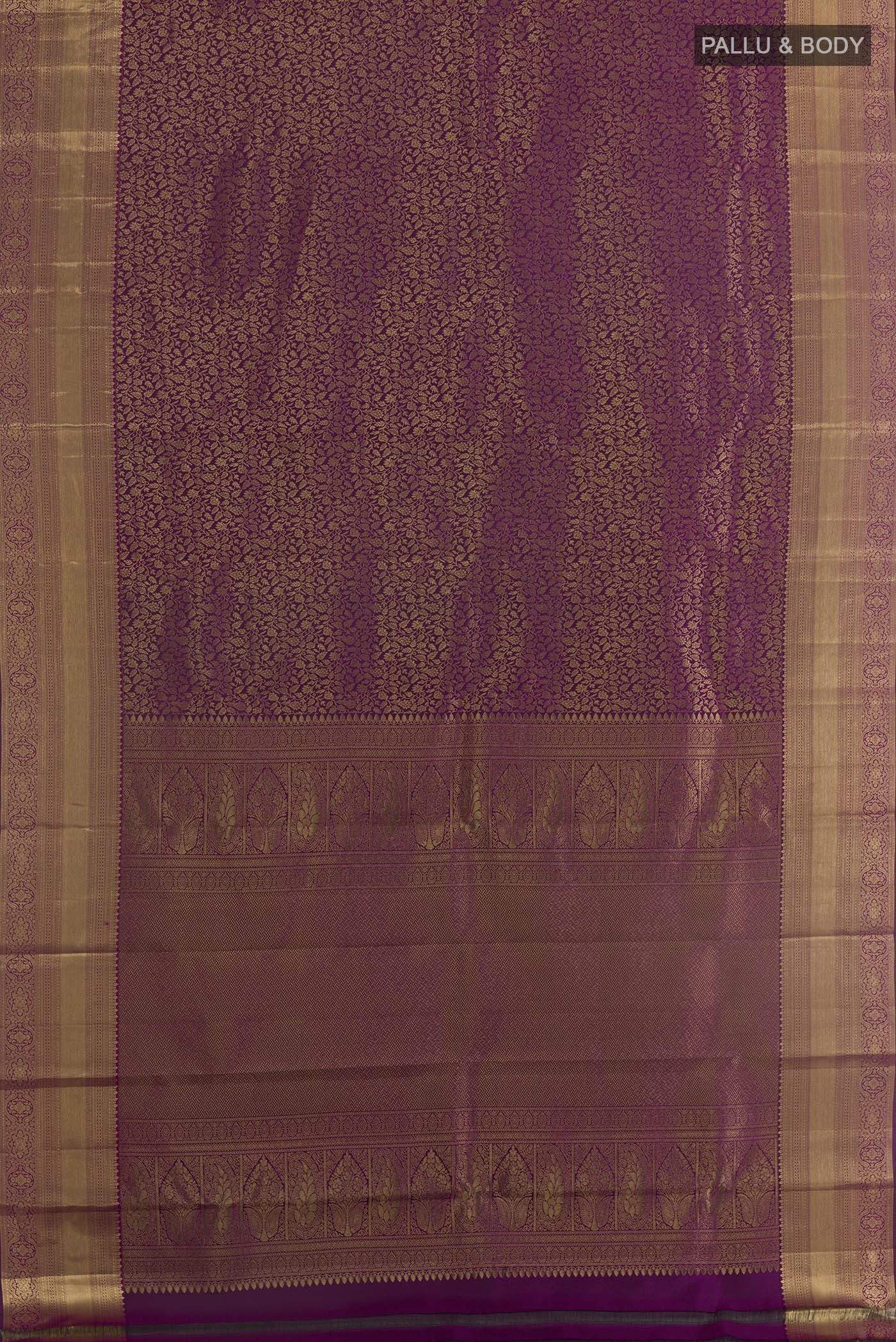 Flat view of Purple Kanchipuram Silk Saree with Zari Brocade on the body and Zari Border. 