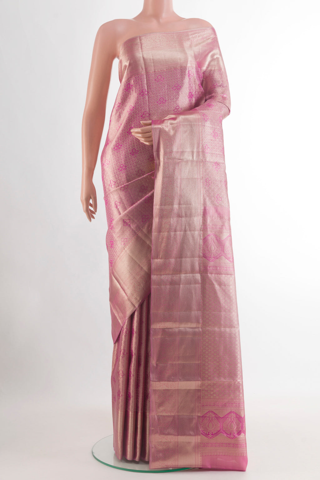 Pink Kanchipuram Silk Saree with Zari Brocade on the body and Zari Border.  displayed on a mannequin