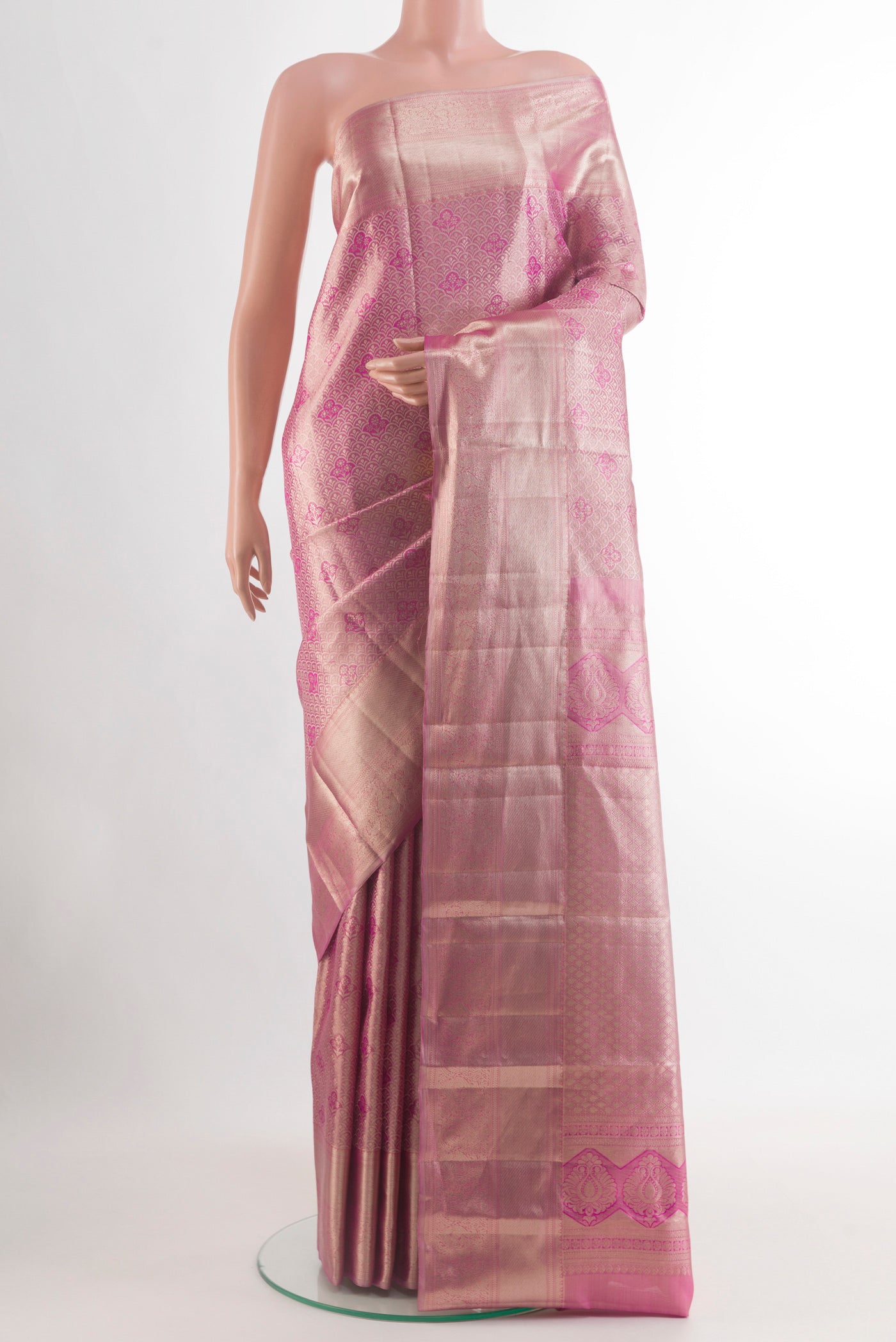 Pink Kanchipuram Silk Saree with Zari Brocade on the body and Zari Border.  displayed on a mannequin
