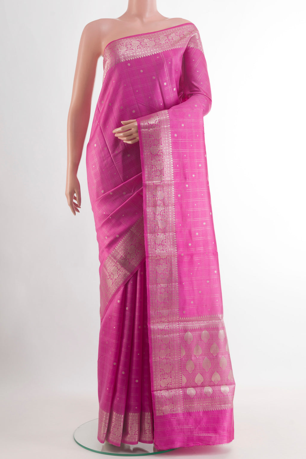 Pink Banarasi Raw Silk Saree with Zari Butta on the body and Zari Border.  displayed on a mannequin